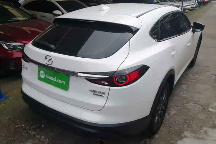 Used Mazda CX-4 2021 2.0L Automatic Two-Wheel Drive Blue Sky Exploration Edition Rear Right 45 Deg