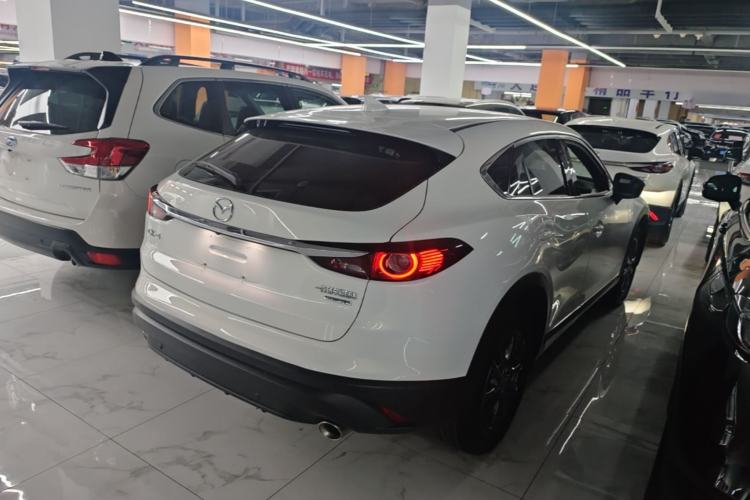 Used Mazda CX-4 2021 2.0L Automatic Two-Wheel Drive Blue Sky Exploration Edition Rear Right 45 Deg