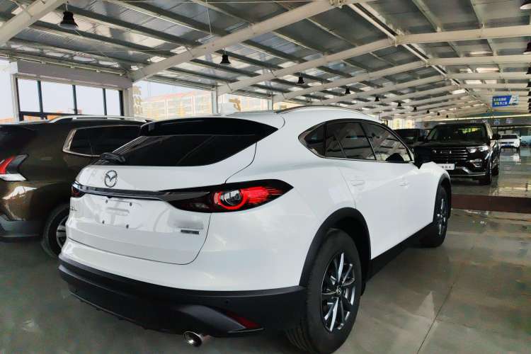 Used Mazda CX-4 2021 2.0L Automatic Two-Wheel Drive Blue Sky Luxury Edition Rear Right 45 Deg