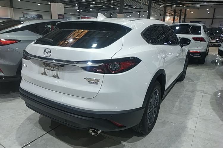 Used Mazda CX-4 2021 2.0L Automatic Two-Wheel Drive Blue Sky Dynamic Edition Rear Right 45 Deg