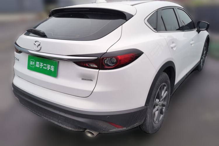 Used Mazda CX-4 2021 2.0L Automatic Two-Wheel Drive Blue Sky Dynamic Edition Rear Right 45 Deg