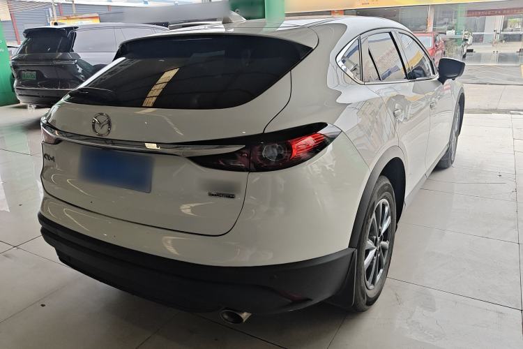 Used Mazda CX-4 2021 2.0L Automatic Two-Wheel Drive Blue Sky Dynamic Edition Rear Right 45 Deg