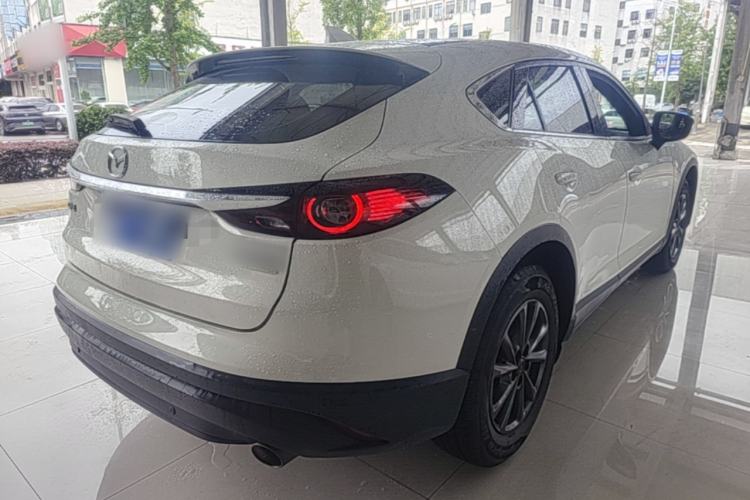Used Mazda CX-4 2021 2.0L Automatic Two-Wheel Drive Blue Sky Exploration Edition Rear Right 45 Deg