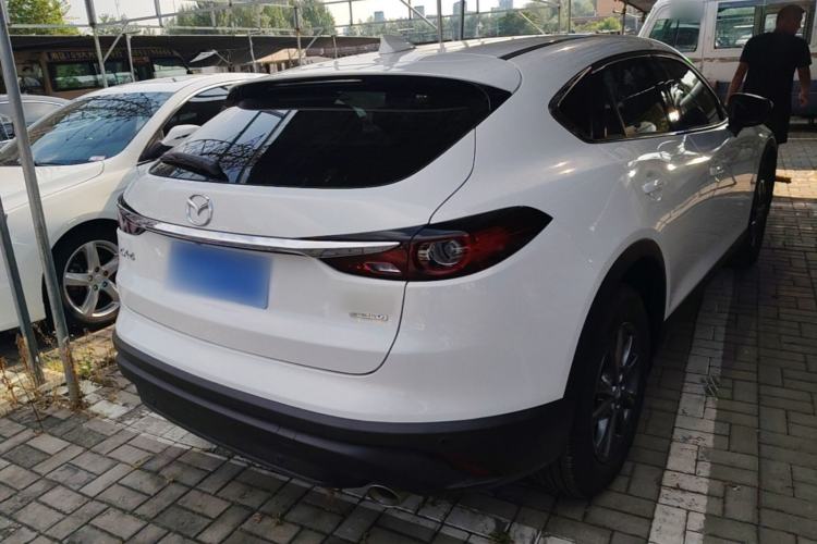 Used Mazda CX-4 2021 2.0L Automatic Two-Wheel Drive Blue Sky Dynamic Edition Rear Right 45 Deg