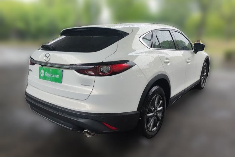 Used Mazda CX-4 2021 2.0L Automatic Two-Wheel Drive Blue Sky Dynamic Edition Rear Right 45 Deg