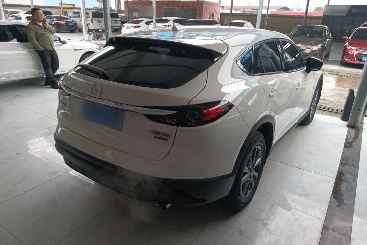 Used Mazda CX-4 2021 2.0L Automatic Two-Wheel Drive Blue Sky Dynamic Edition Rear Right 45 Deg