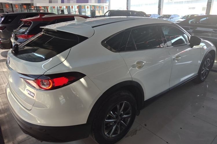 Used Mazda CX-4 2021 2.0L Automatic Two-Wheel Drive Blue Sky Dynamic Edition Rear Right 45 Deg
