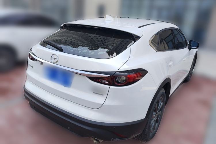 Used Mazda CX-4 2021 2.0L Automatic Two-Wheel Drive Blue Sky Dynamic Edition Rear Right 45 Deg