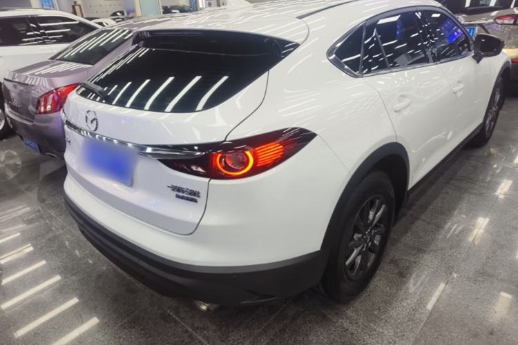 Used Mazda CX-4 2021 2.0L Automatic Two-Wheel Drive Blue Sky Exploration Edition Rear Right 45 Deg