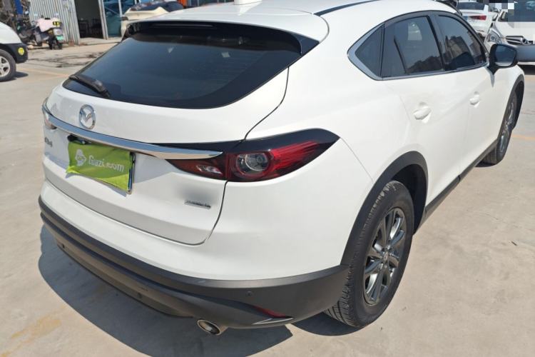 Used Mazda CX-4 2021 2.0L Automatic Two-Wheel Drive Blue Sky Dynamic Edition Rear Right 45 Deg