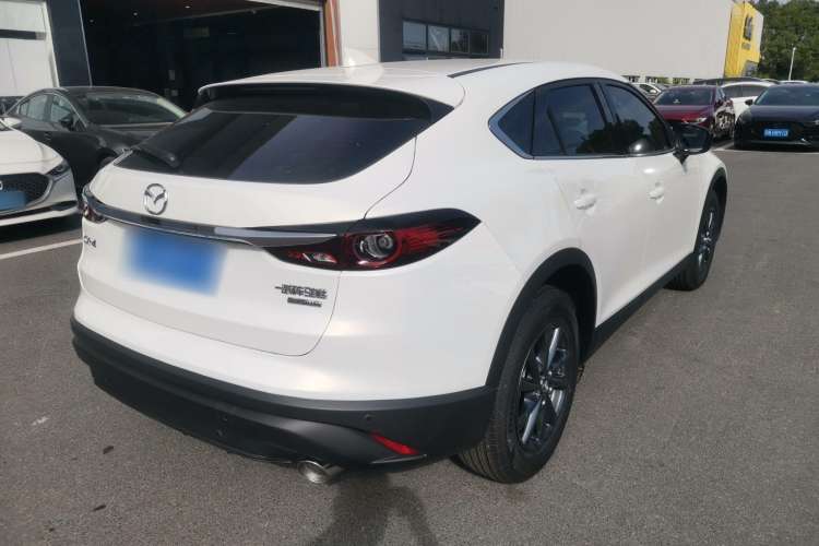 Used Mazda CX-4 2021 2.0L Automatic Two-Wheel Drive Blue Sky Dynamic Edition Rear Right 45 Deg