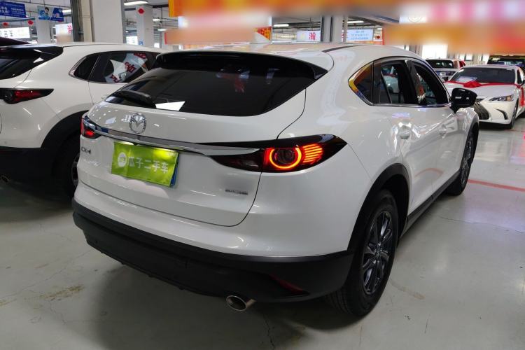 Used Mazda CX-4 2021 2.0L Automatic Two-Wheel Drive Blue Sky Exploration Edition Rear Right 45 Deg