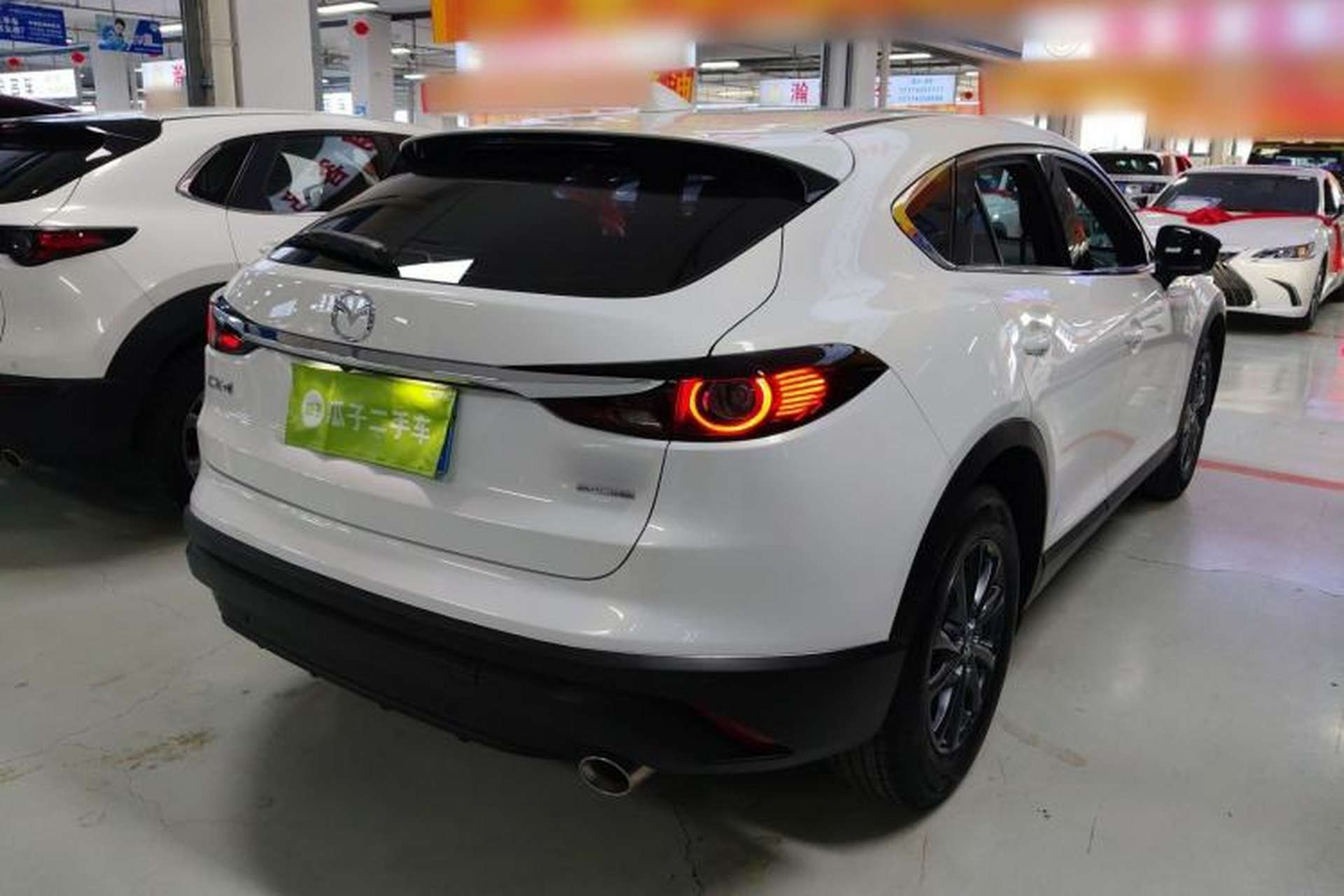 Used Mazda CX-4 2021 2.0L Automatic Two-Wheel Drive Blue Sky Exploration Edition Rear Right 45 Deg