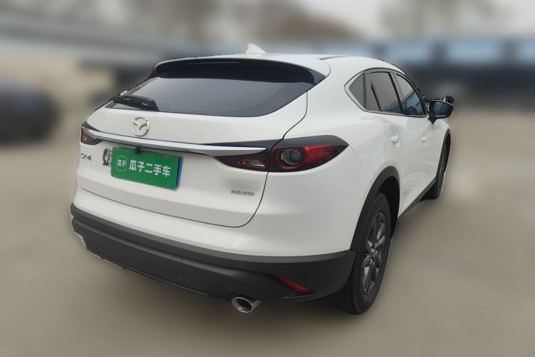Used Mazda CX-4 2021 2.0L Automatic Two-Wheel Drive Blue Sky Dynamic Edition Rear Right 45 Deg