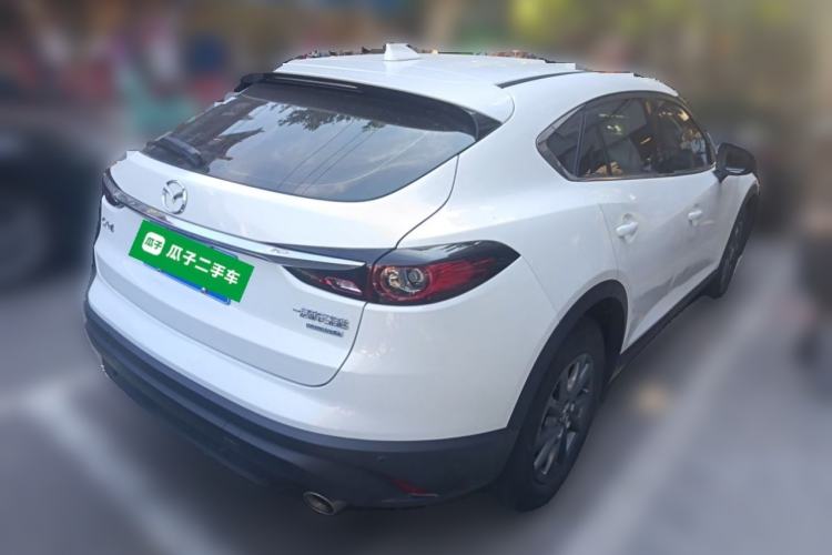 Used Mazda CX-4 2021 2.0L Automatic Two-Wheel Drive Blue Sky Exploration Edition Rear Right 45 Deg