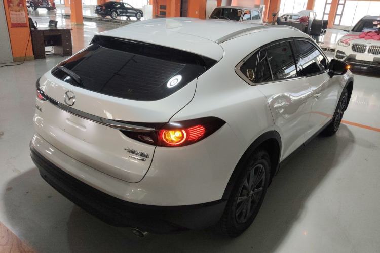 Used Mazda CX-4 2021 2.0L Automatic Two-Wheel Drive Blue Sky Luxury Edition Rear Right 45 Deg