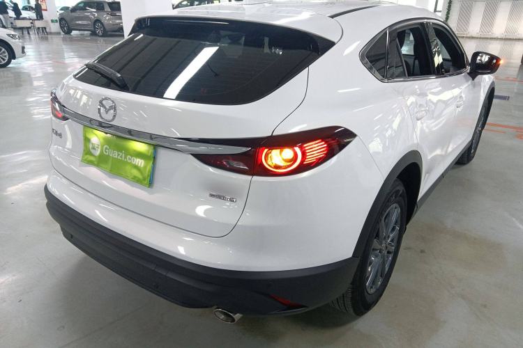 Used Mazda CX-4 2021 2.0L Automatic Two-Wheel Drive Blue Sky Exploration Edition Rear Right 45 Deg