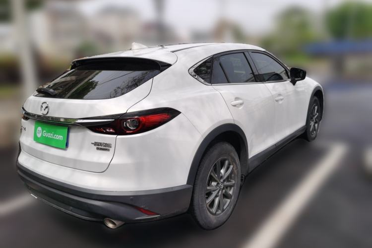 Used Mazda CX-4 2021 2.0L Automatic Two-Wheel Drive Blue Sky Dynamic Edition Rear Right 45 Deg