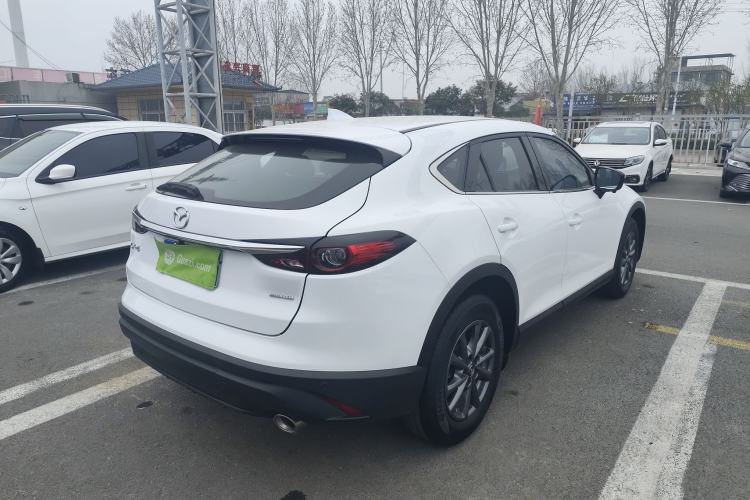 Used Mazda CX-4 2021 2.0L Automatic Two-Wheel Drive Blue Sky Dynamic Edition Rear Right 45 Deg