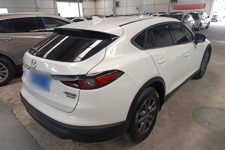 Used Mazda CX-4 2021 2.0L Automatic Two-Wheel Drive Blue Sky Exploration Edition Rear Right 45 Deg