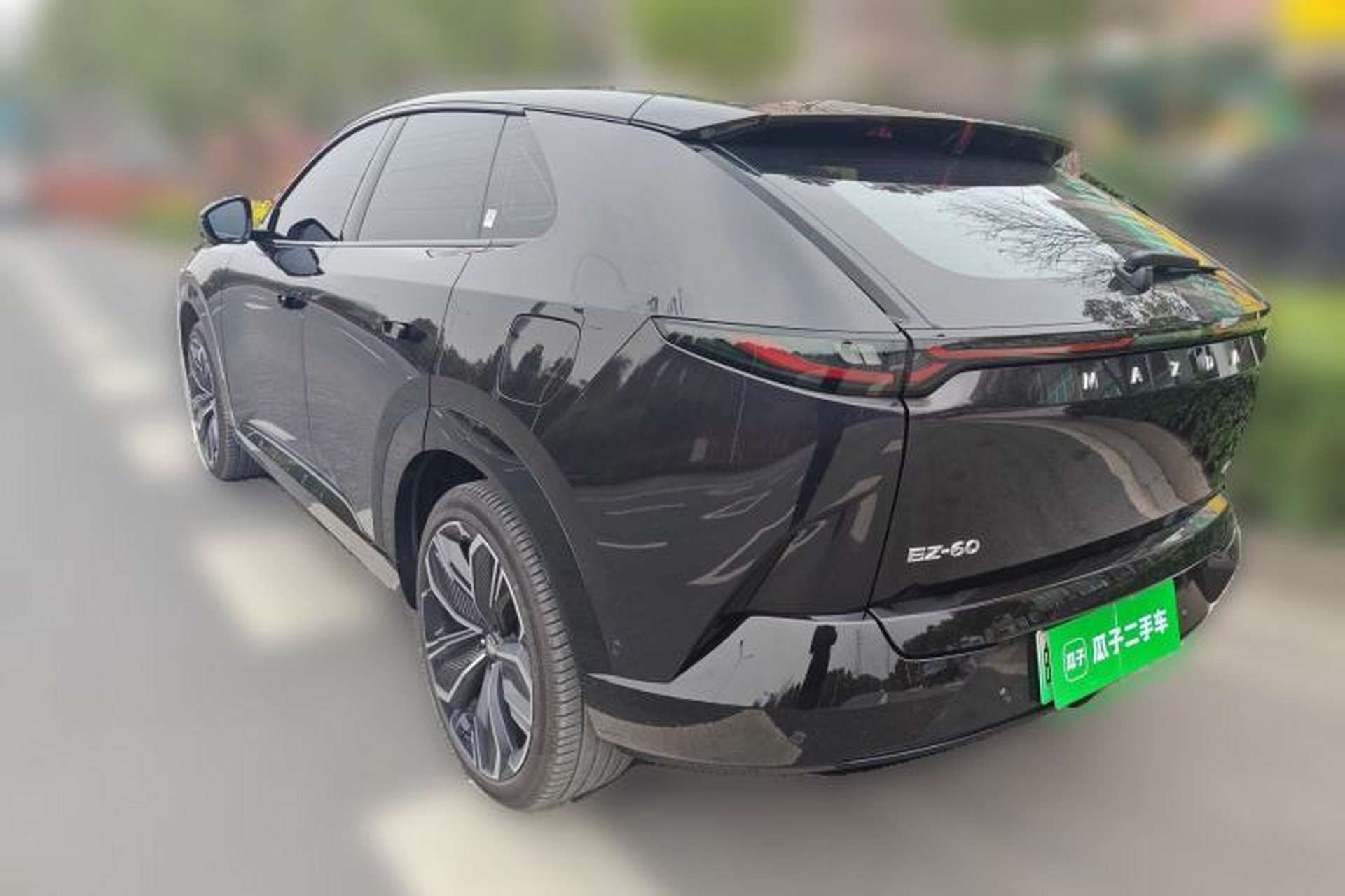 Used Mazda EZ-60 2025 Model Range-Extended 200 Max Rear Left 45 Deg