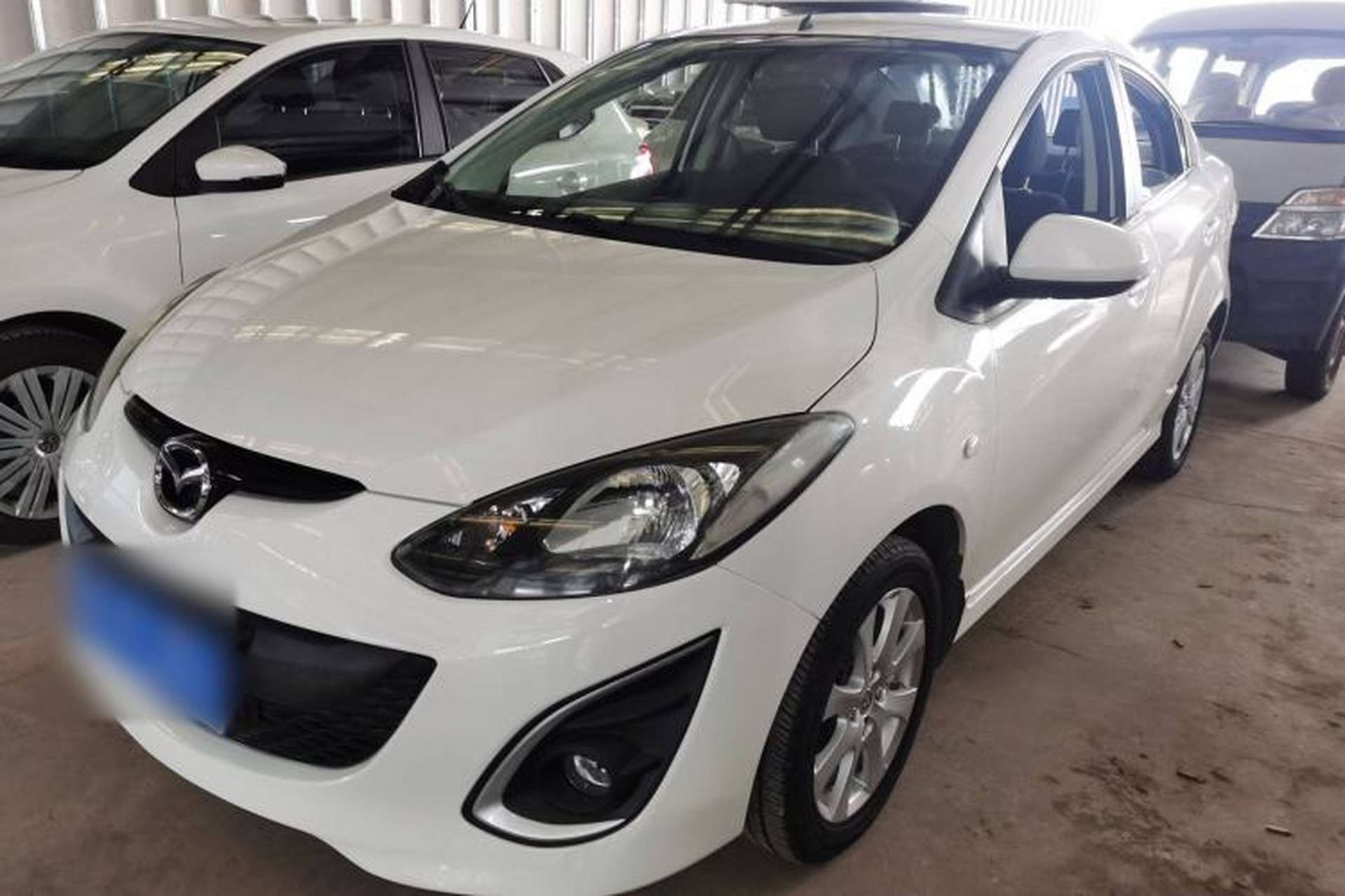 Used Mazda 2 2012 Sedan XuanDong 1.5L Manual Fashion Edition Front Left 45 Deg