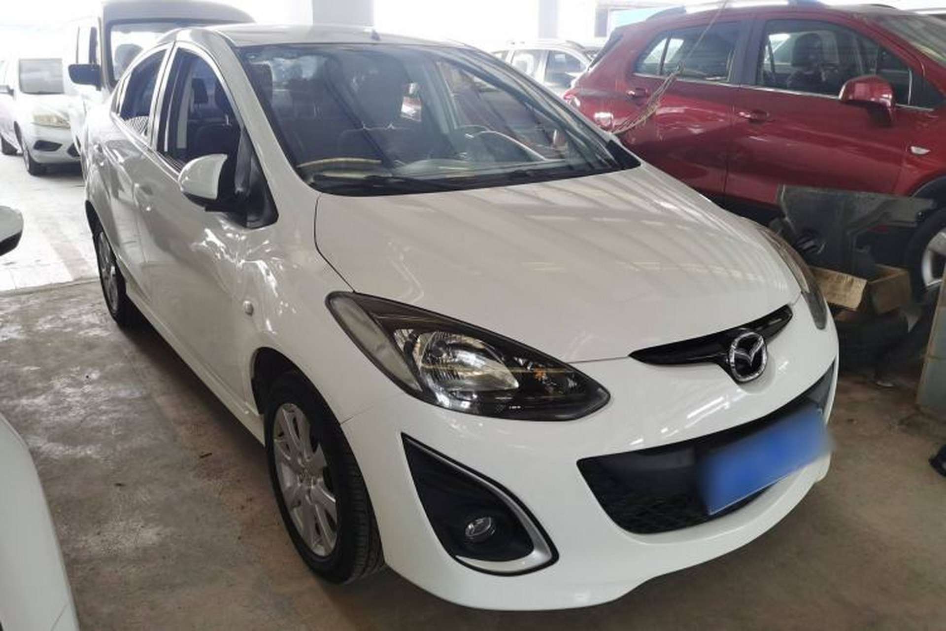 Used Mazda 2 2012 Sedan XuanDong 1.5L Manual Fashion Edition Front Right 45 Deg