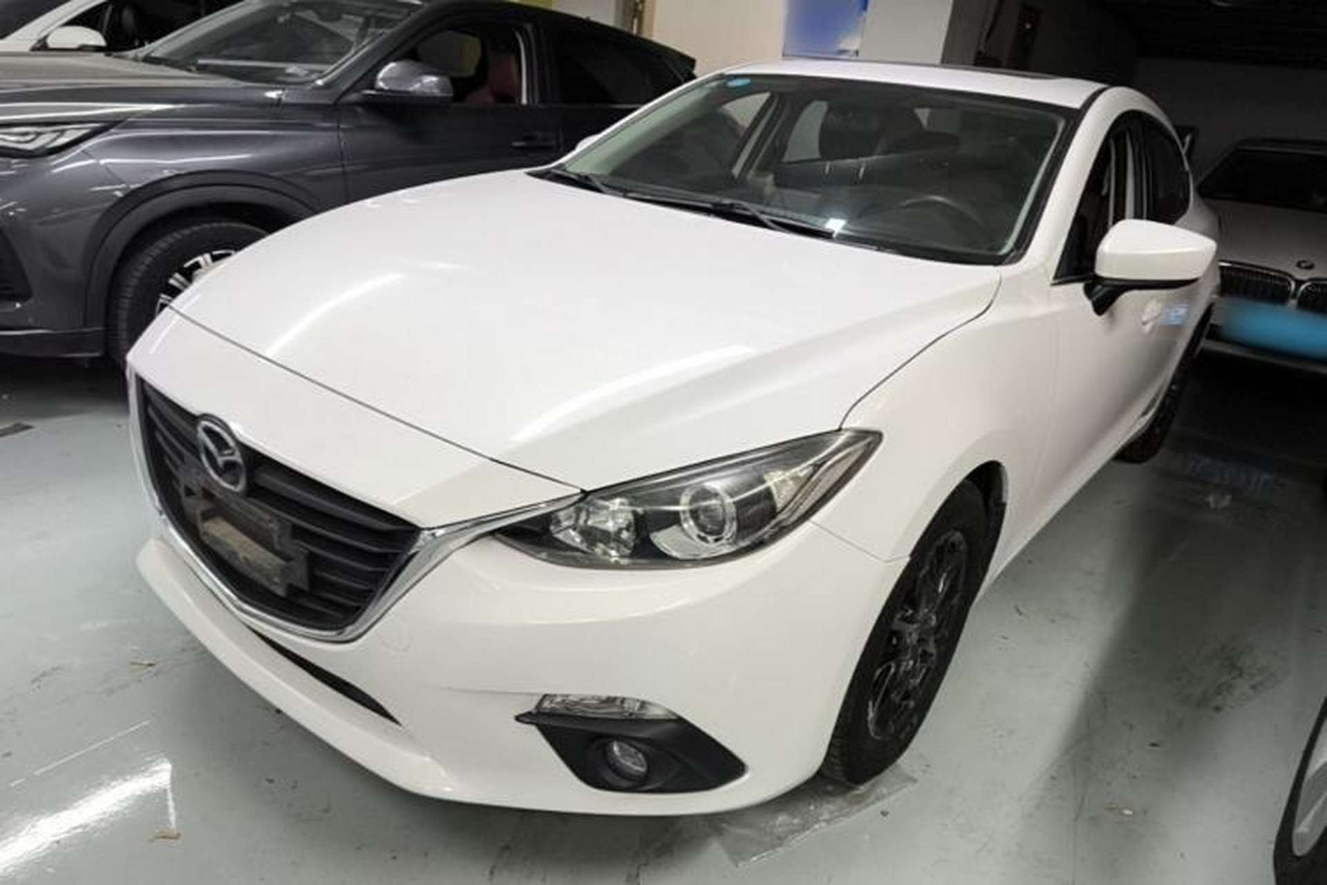 Used Mazda 3 Axela 2014 Sedan 1.5L Automatic Luxury Model Front Left 45 Deg