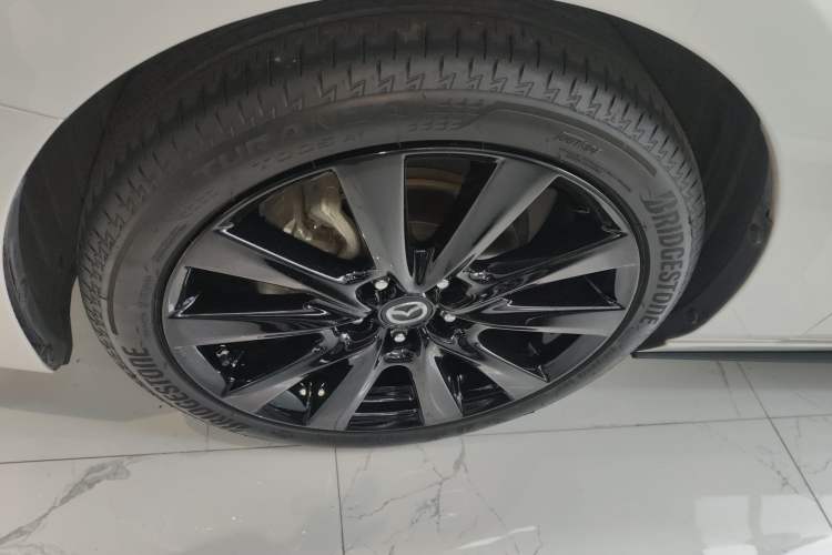 Used Mazda 3 Axela 2022 2.0L Automatic Premium Black Obsidian Edition Left Front Wheel Hub