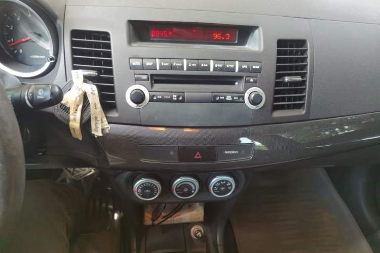 Used Mitsubishi Lancer EX 2010 Chasing Edition 1.8L Manual Luxury Model Audio And AC Panel