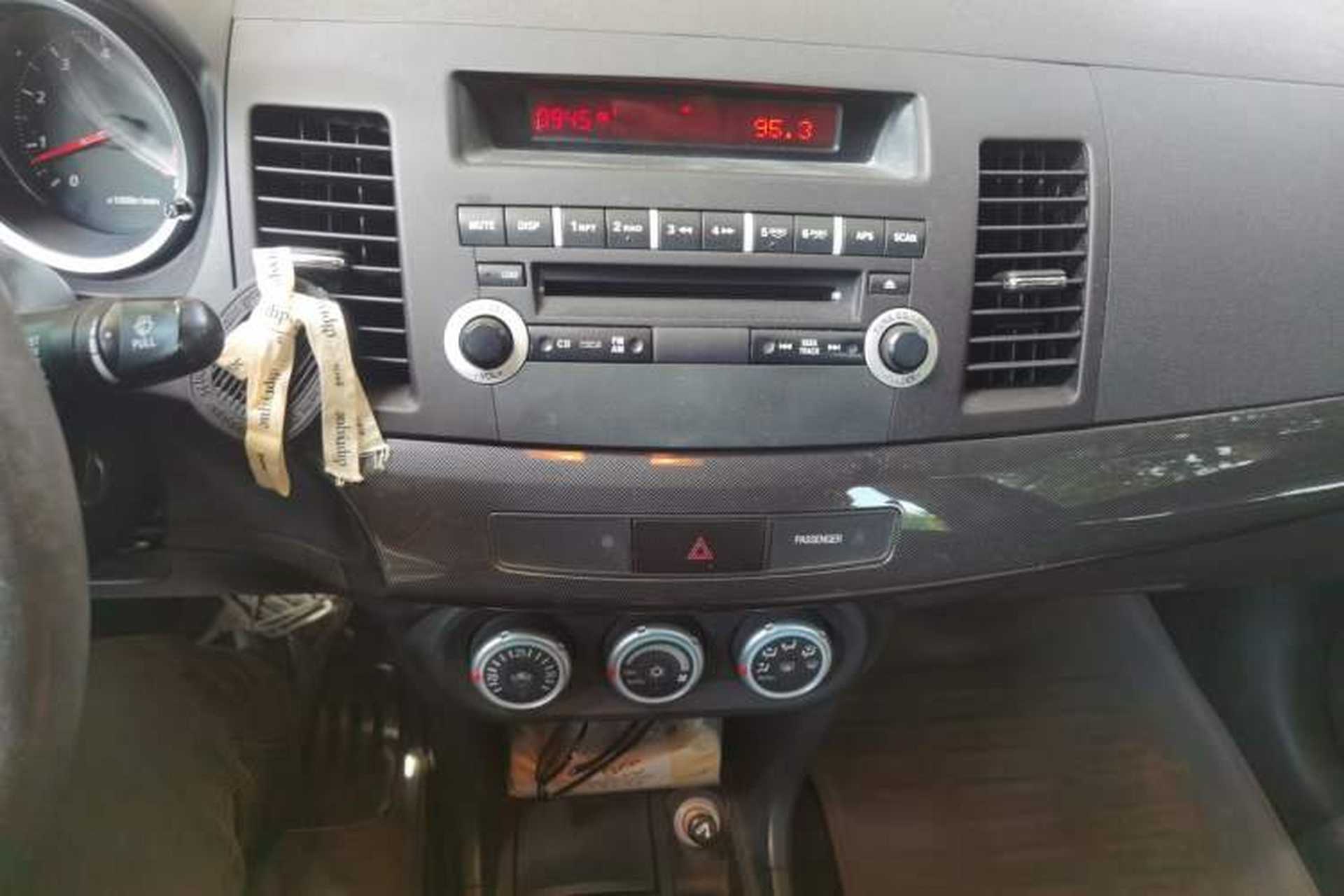 Used Mitsubishi Lancer EX 2010 Chasing Edition 1.8L Manual Luxury Model Audio And AC Panel