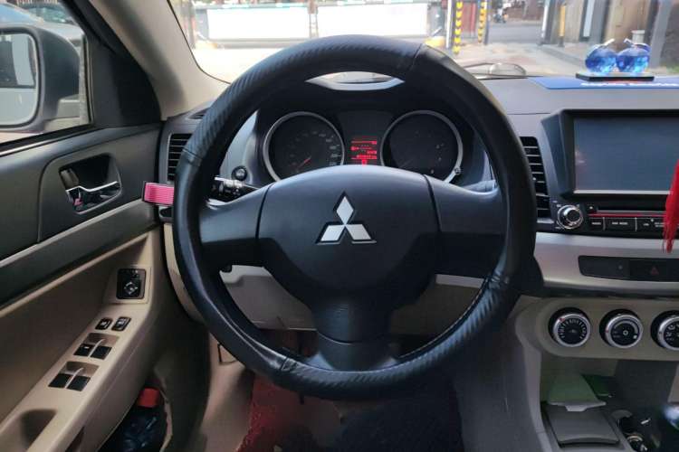 Used Mitsubishi Lancer EX 2010 Fashion Edition 1.8L Manual Comfort Trim Steering Wheel