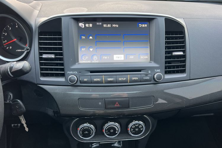 Used Mitsubishi Lancer EX 2011 Chasing Edition 1.8L Manual Luxury Model Audio And AC Panel