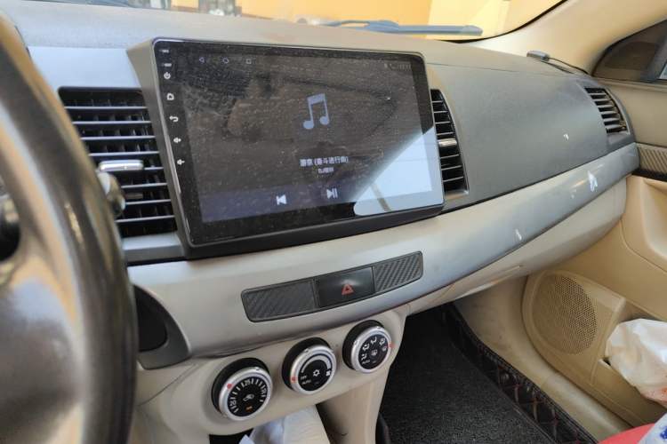Used Mitsubishi Lancer EX 2011 Fashion Edition 1.8L Manual Smart Type Audio And AC Panel