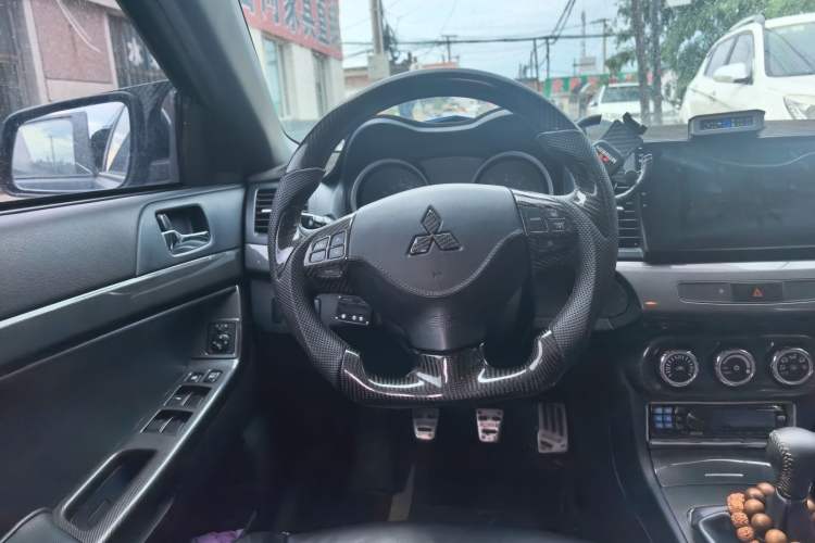 Used Mitsubishi Lancer EX 2011 Xiali Edition 2.0L Manual Comfort Model Steering Wheel