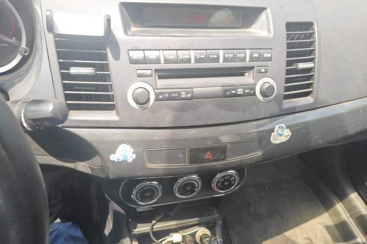 Used Mitsubishi Lancer EX 2011 Chasing Edition 1.8L Manual Luxury Model Audio And AC Panel