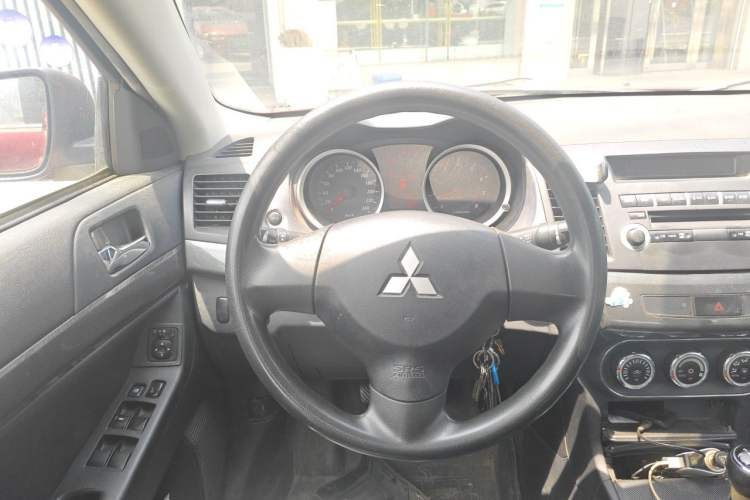 Used Mitsubishi Lancer EX 2011 Chasing Edition 1.8L Manual Luxury Model Steering Wheel