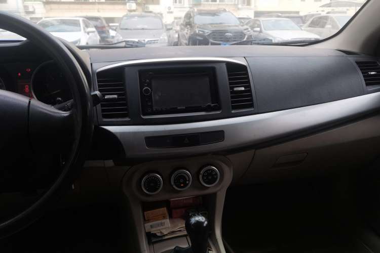 Used Mitsubishi Lancer EX 2011 Fashion Edition 1.8L Manual Smart Type Audio And AC Panel