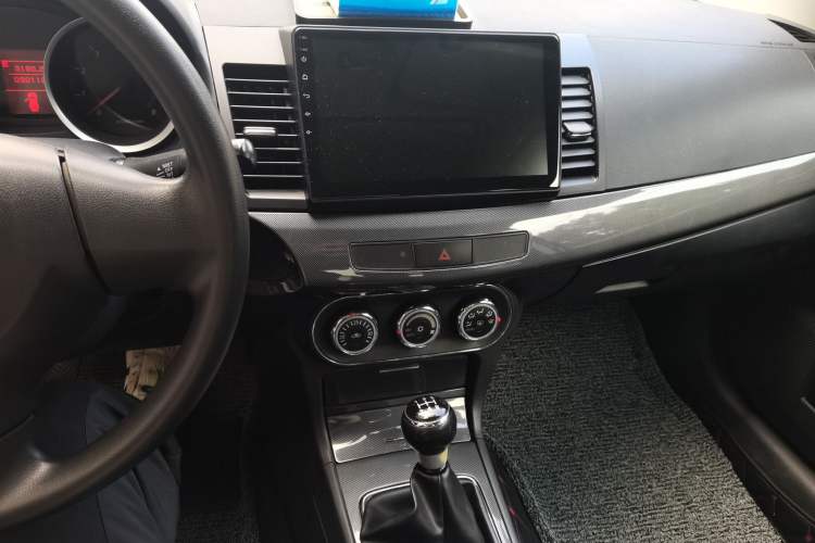 Used Mitsubishi Lancer EX 2011 Chasing Edition 1.8L Manual Luxury Model Audio And AC Panel
