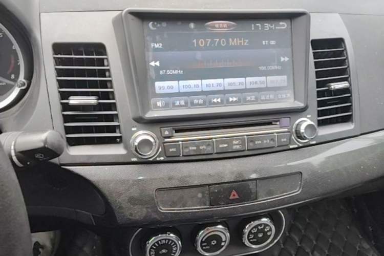 Used Mitsubishi Lancer EX 2011 Chasing Edition 1.8L Manual Luxury Model Audio And AC Panel