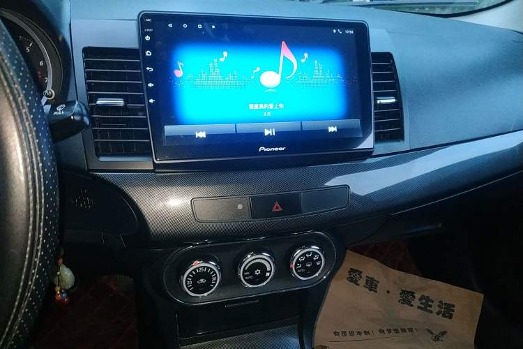 Used Mitsubishi Lancer EX 2011 Chasing Edition 1.8L Manual Luxury Model Audio And AC Panel