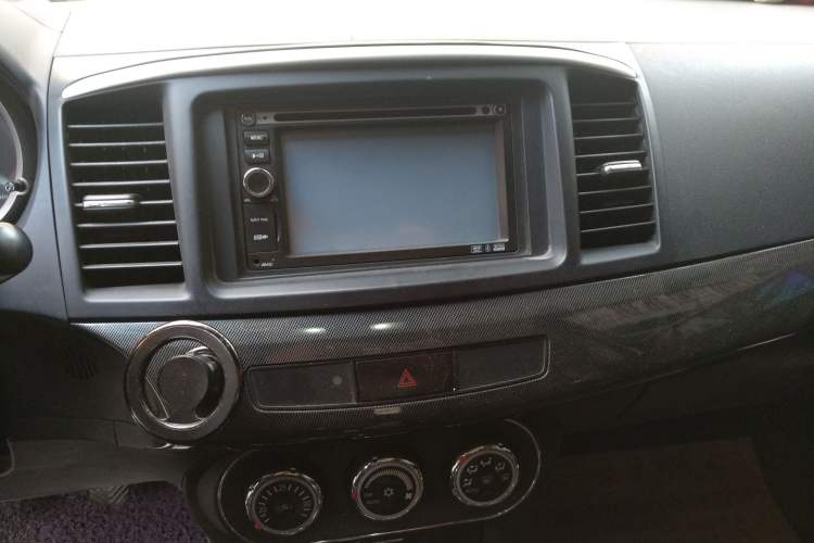 Used Mitsubishi Lancer EX 2011 Chasing Edition 1.8L Manual Luxury Model Audio And AC Panel