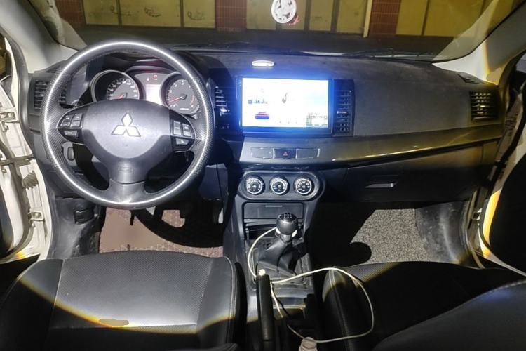 Used Mitsubishi Lancer EX 2011 Chasing Edition 1.8L Manual Luxury Model Center Console