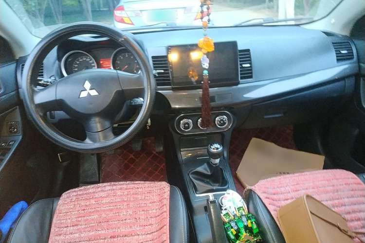 Used Mitsubishi Lancer EX 2011 Chasing Edition 1.8L Manual Luxury Model Center Console