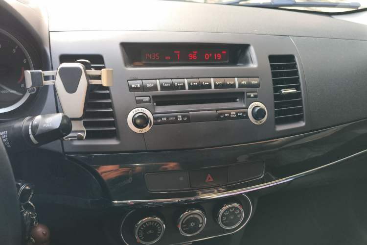Used Mitsubishi Lancer EX 2012 Chasing Edition 1.8L Manual Luxury Model Audio And AC Panel