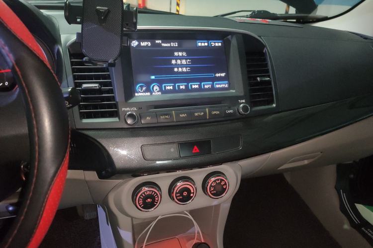 Used Mitsubishi Lancer EX 2012 1.8L Manual Charm Edition Audio And AC Panel