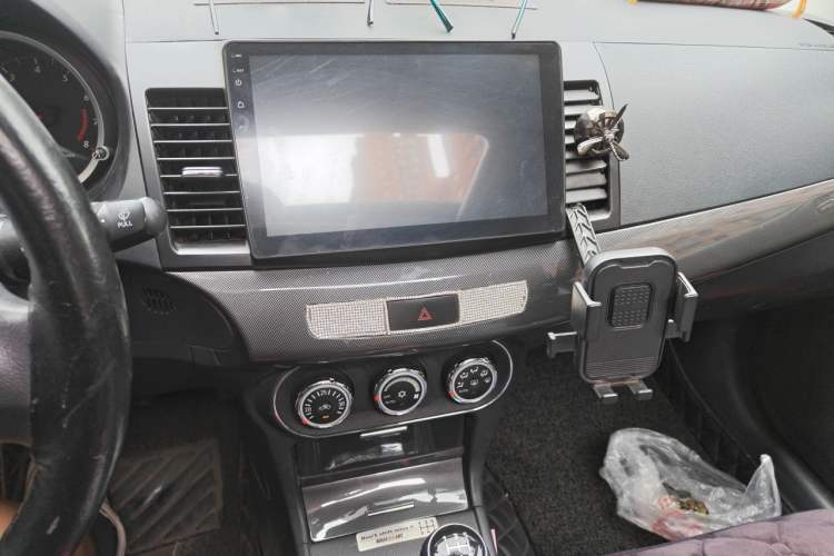 Used Mitsubishi Lancer EX 2012 Chasing Edition 1.8L Manual Luxury Model Audio And AC Panel