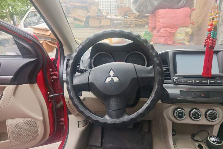 Used Mitsubishi Lancer EX 2012 Fashion Edition 1.8L Manual Comfort Version Steering Wheel
