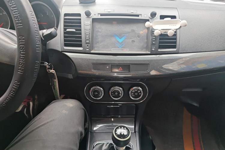Used Mitsubishi Lancer EX 2012 Chasing Edition 1.8L Manual Luxury Model Audio And AC Panel