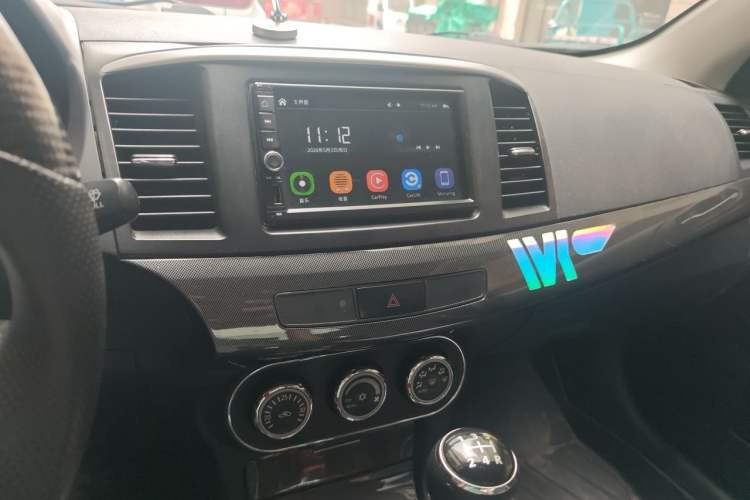 Used Mitsubishi Lancer EX 2012 1.8L Manual Charm Edition Audio And AC Panel